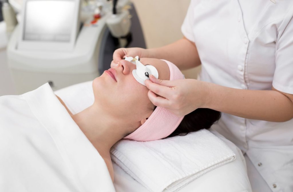 a woman is about to undergo IPL therapy to mitigate her dry eye symptoms.